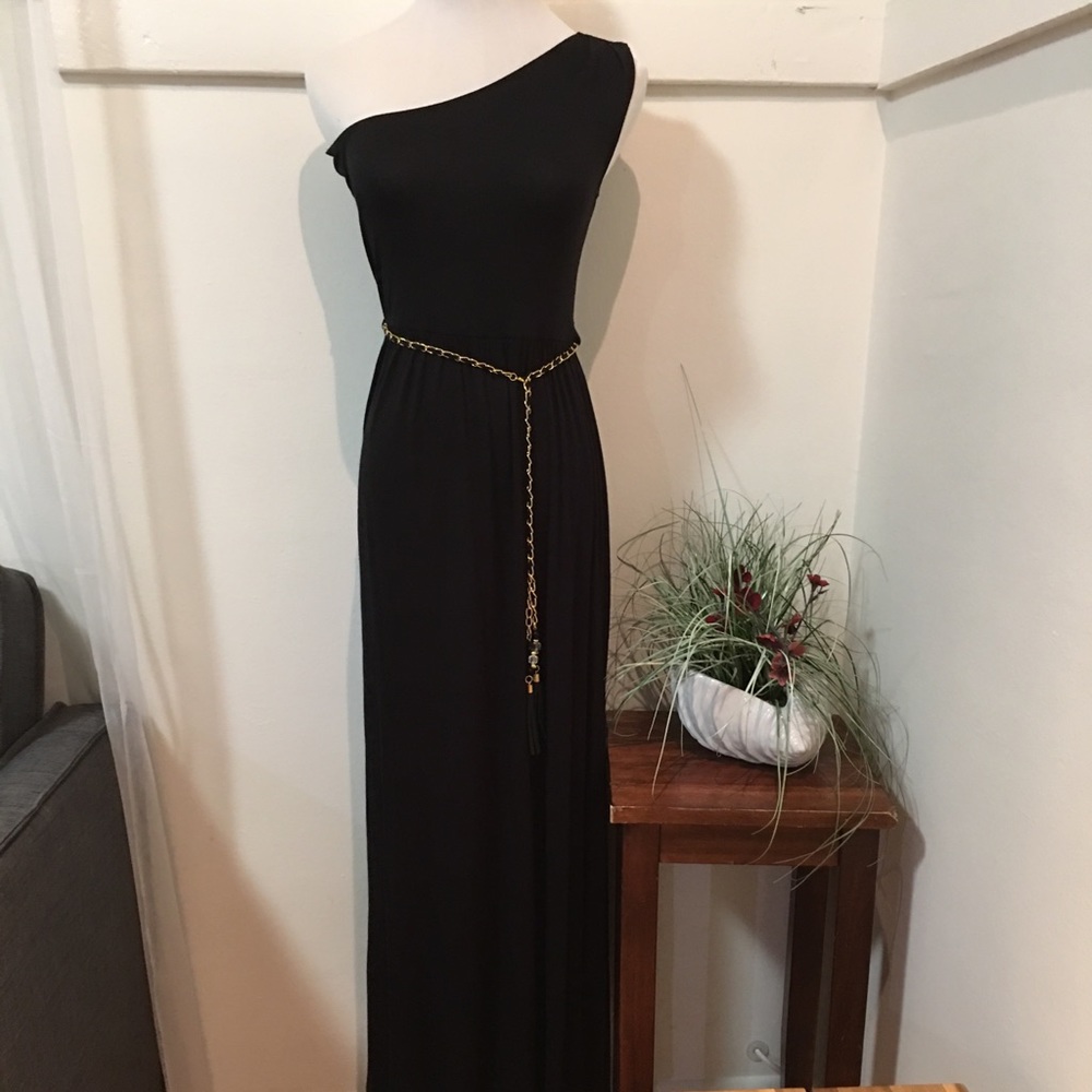 Black off ahould dress with gold accent belt